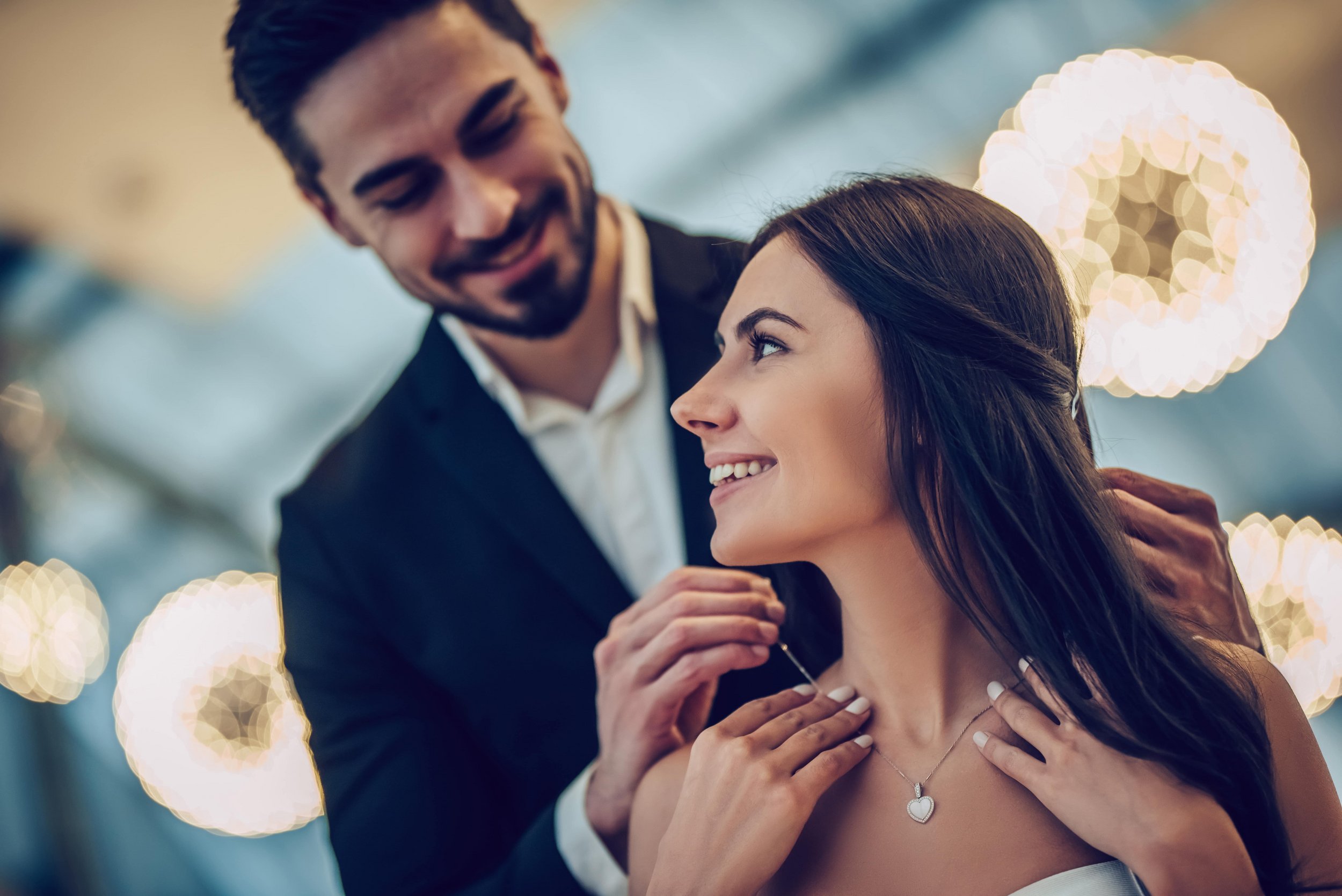 happy couple with new jewelry